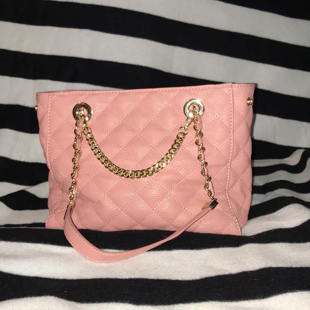 Charming Charlie‘s blush pink handbag